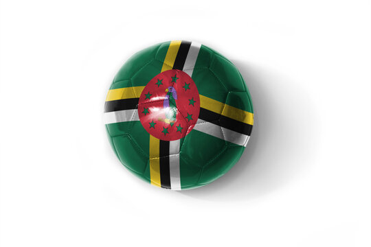 realistic football ball with colorfull national flag of dominica on the white background.