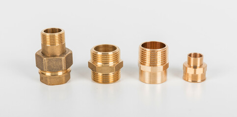 Brass fasteners for use in heating. fasteners and fittings on the white background