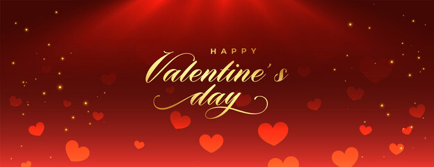 Fototapeta na wymiar red valentines day sparkling banner with light effect and hearts