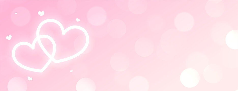 beautiful two neon glowing white hearts on pink bokeh background