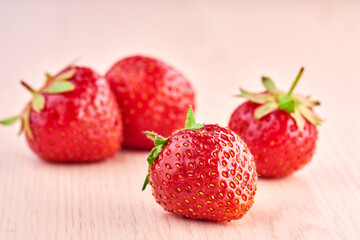 strawberries on a wooden background