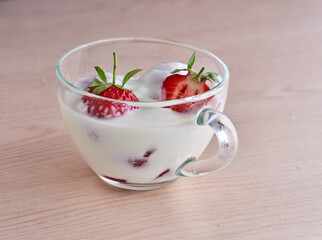 yogurt with strawberries in cap