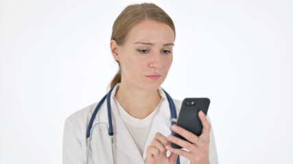 Female Doctor Browsing Smartphone on White Background