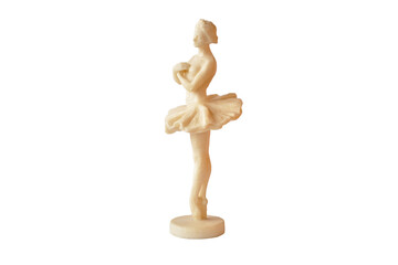 Figurine of a ballerina on a white background. Handmade ivory figurine of a dancing ballerina