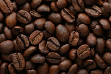 Coffee beans background. Background of roasted coffee beans
