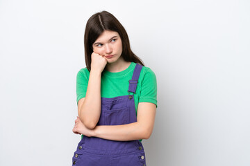 Young Russian woman isolated on blue background with tired and bored expression