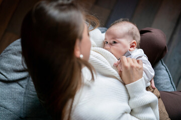 Woman breastfeeding newborn baby. Mother breastfeeding newborn boy. concept breastfeeding. Baby...