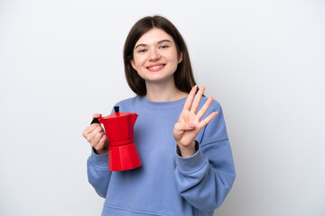 Young Russian woman holding coffee pot isolated on white background happy and counting four with fingers