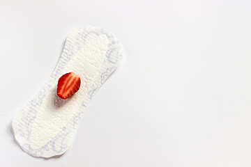 Feminine hygiene panty liner for menstruation. Menstrual cycle, pad. White background.	
