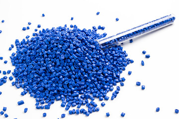 blue granules of polypropylene, polyamide. White background. Plastic and polymer industry....