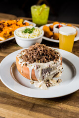 Colorful Food Appetizer Starts Snacks Fresh Delicious Menu Recipe Meal Meat Chicken Fries Fish Seafood Beer on a wooden table