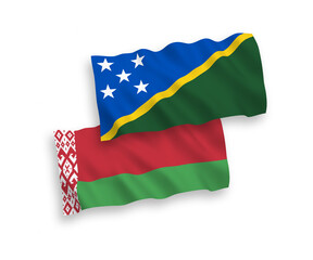 Fototapeta premium Flags of Solomon Islands and Belarus on a white background