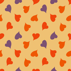 Seamless pattern with multicolored hearts on a yellow background. Romantic pattern for Valentine's day. Design of textiles, wrapping paper, notebooks and banners and flyers.