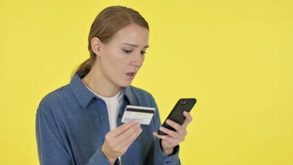 Online Shopping Failure on Smartphone by Woman on Yellow Background