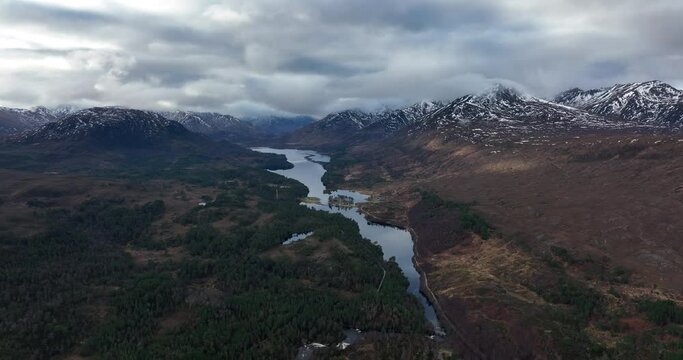 Aerial view of Glen Affric in the highlands of Scotland near Inverness and Canich showing the flat calm lochs amongst Munro mountains