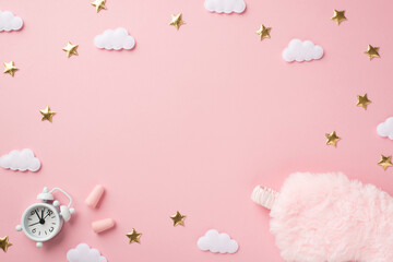 Top view photo of white alarm clock pink fluffy sleeping mask earplugs golden stars and clouds on isolated pastel pink background with blank space in the middle