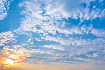 blue sky and white clouds or cloudscape at sunset or evening time. for breathing concepts background.
