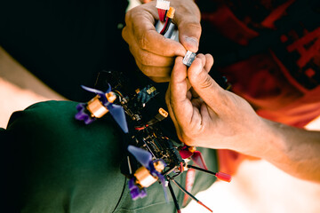 Drone operator assembling an FPV drone