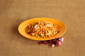sambal fried rice with chili paste and raw onion on wood background top view rice 