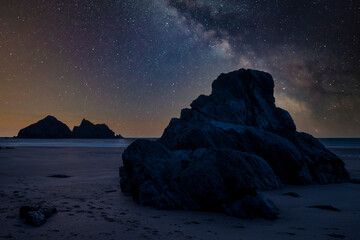 Absolutely beautiful landscape images of Holywell Bay beach in Cornwall UK during golden hojur sunset in Spring