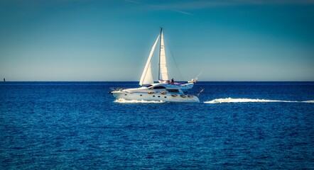 yacht and sailing ship at the sea