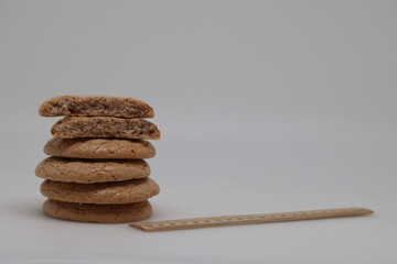 Nut cookies on electronic kitchen scales, accurate calorie counting, proper nutrition.