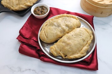 Himachal Pradesh special dish siddu. It's a steamed wheat flour bread stuffed with split black gram...