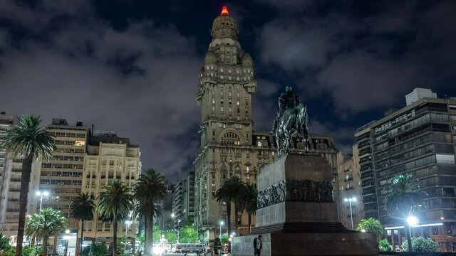 Zoom in time lapse view of Independence Square showing historical landmark Artigas Mausoleum at night in the Old Town district of Montevideo, Uruguay.	
