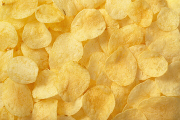 Full frame foodbackground of potato chips, top view