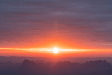 Sunrise with cloudy and blue sky background. Nature and outdoor background in national park at Thailand