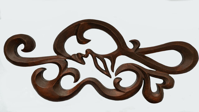 Fine wood carving on a white background 