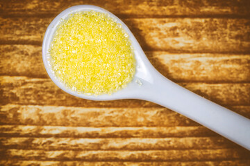 Confectionary Sugar in Rustic Wood Background