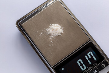 Electronic scales drugs in the form of heroin.