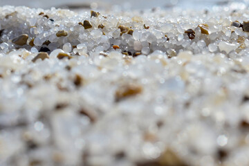Close up of salt background. Natural salt. Dead Sea salt mineral natural formations. Salt crystals from Dead sea. View of Dead Sea coastline. Texture of Dead sea. Salty seashore rocks