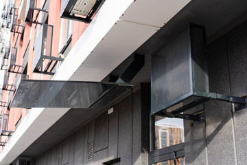 box for air conditioner on the facade of the building