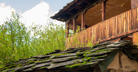 Old traditional Bulgarian house in mountain village of Kovachevitsa. Traditional slan stone roofs