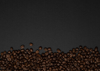coffee beans on a black background. place for text
