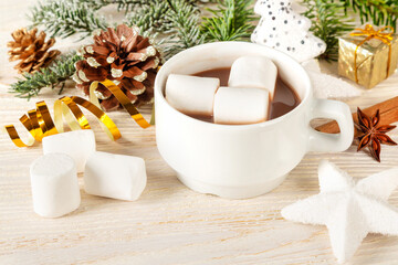 Cocoa drink with marshmallow in a white cup