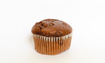 chocolate muffin with chocloate drops isolated on white background