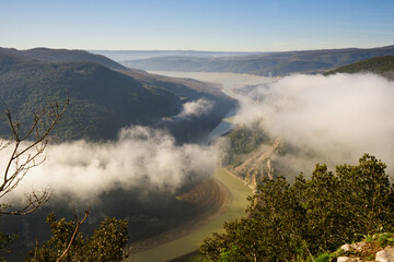 Corbara Lake view over the clouds in a winter morning, Titignano, Orvieto, Terni, Umbria, Italy