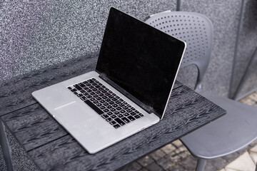 laptop on table in cafe