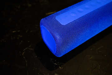 bluetooth speaker on a black background. Free space for text