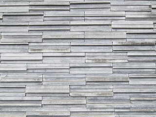 Luxury multi layer brick square shape gray color. strong brickwork wall outdoor house rock.