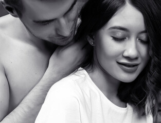 young pretty couple together in bed sleeping chill, lifestyle people concept, black and white