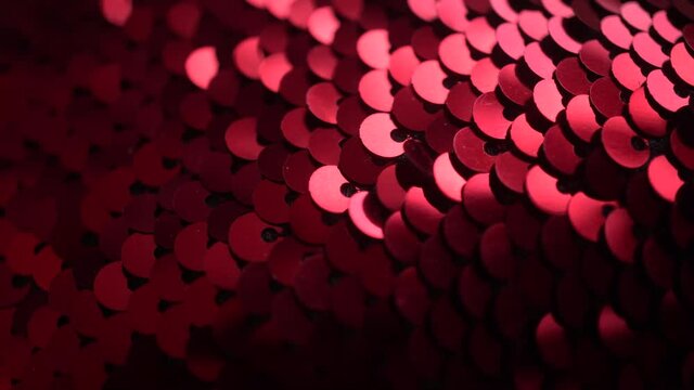 Background From Red Sequins On Fabric