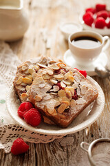 Bostock with the addition of almond cream (frangipane) and raspberries made of baked brioche slices...