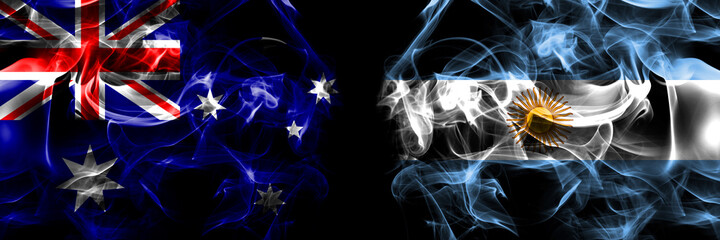 Flags of Australia, Australian vs Argentina, Argentinian, Argentine. Smoke flag placed side by side on black background