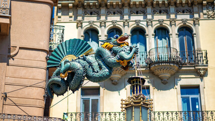 Fototapeta premium Dragon statue on a building in Barcelona, Spain