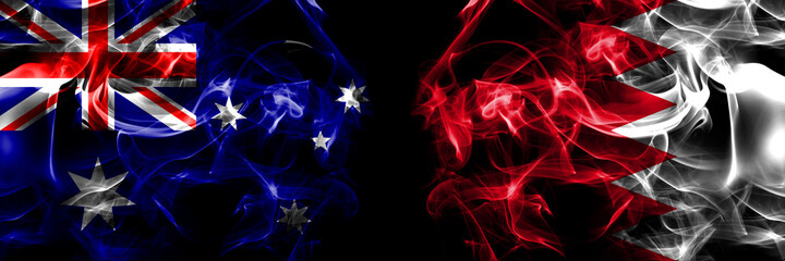 Flags of Australia, Australian vs Bahrain, Bahraini. Smoke flag placed side by side on black background