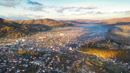 Aerial drone view of Viseu de Sus at sunset, Romania - obrazy, fototapety, plakaty